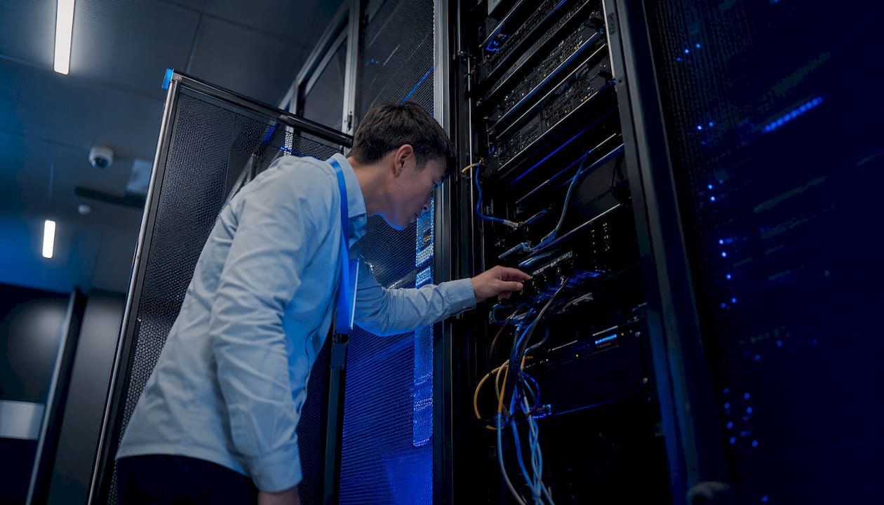 Technician connecting hardware security module